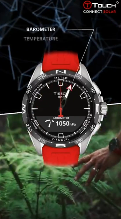 Animation verticale : montre Tissot à bracelet rouge devant un décor de fougères, avec l’affichage du baromètre